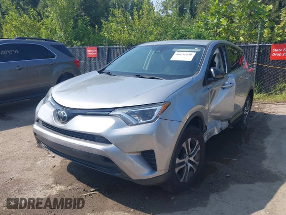 2018 Toyota RAV4 LE with VIN JTMZFREV3JJ161811, listed as a IAAI auction lot 40131640 with 114,330 mi miles. Bid and sale history available at carsss.com. Image 17.