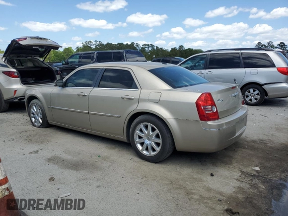 2009 Chrysler 300 Touring with VIN 2C3KA53V69H592639, listed as a Copart auction lot 55209775 with 107,751 mi miles and Salvage Title. Bid and sale history available at DreamBid. Image 2.