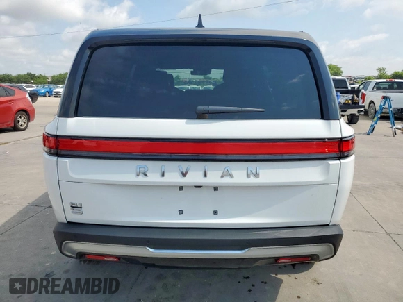 2025 Rivian R1S Adventure z VIN 7PDSGBBA3SN046975, wystawiony jako Copart lot #61790405 z przebiegiem 8 427 mil mil oraz Szkoda całkowita • Salvage title. Historia ofert i sprzedaży dostępna na DreamBid. Obrazek 6.