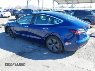 2019 Tesla Model 3 Mid Range with VIN 5YJ3E1EA8KF436086, listed as a IAAI auction lot 41682093 with 70,332 mi miles and . Bid and sale history available at DreamBid. Image 3.