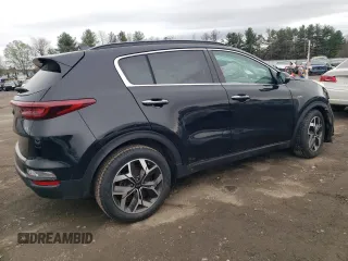 2020 Kia Sportage EX z VIN KNDPNCAC1L7779818, wystawiony jako Copart lot #51934025 z przebiegiem 77 170 mil mil oraz Szkoda całkowita • Salvage title. Historia ofert i sprzedaży dostępna na DreamBid. Obrazek 3.