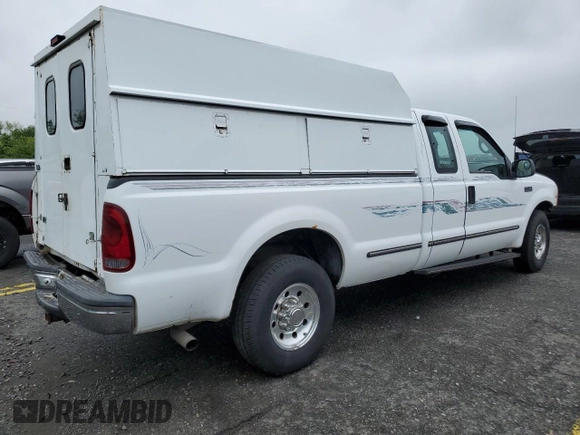 1999 Ford F-250 XL with VIN 1FTNX20L3XEA81807, listed as a Copart auction lot 58036385 with 251,614 mi miles and Salvage title. Bid and sale history available at DreamBid. Image 3.