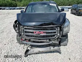 2015 GMC Yukon SLT with VIN 1GKS2BKC2FR666386, listed as a Copart auction lot 68471204 with 154,041 mi miles and Salvage Title. Bid and sale history available at carsss.com. Image 11.