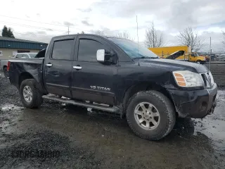 2005 Nissan Titan LE with VIN 1N6AA07B15N552302, listed as a Copart auction lot 44396985 with 172,401 mi miles and Salvage Title. Bid and sale history available at carsss.com. Image 4.