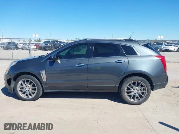 2013 Cadillac SRX Performance Collection with VIN 3GYFNDE38DS568561, listed as a IAAI auction lot 41701063 with 139,191 mi miles. Bid and sale history available at carsss.com. Image 14.