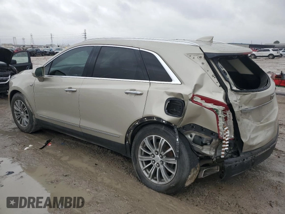 2017 Cadillac XT5 Luxury FWD with VIN 1GYKNBRS5HZ123174, listed as a Copart auction lot 43193045 with 96,617 mi miles and Salvage Title. Bid and sale history available at DreamBid. Image 2.