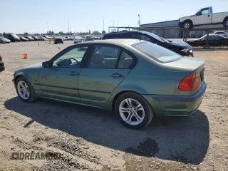 1999 BMW 3 Series 323i with VIN WBAAM3333XFP52697, listed as a Copart auction lot 62747084 with 252,596 mi miles and Salvage Title. Bid and sale history available at carsss.com. Image 2.