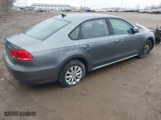 2014 Volkswagen Passat Wolfsburg Ed with VIN 1VWAT7A37EC100581, listed as a IAAI auction lot 41535884 with 119,169 mi miles. Bid and sale history available at carsss.com. Image 4.