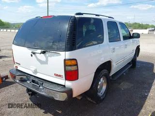 2004 GMC Yukon SLT with VIN 1GKEK13Z94J232083, listed as a IAAI auction lot 42101575 with 310,866 mi miles and . Bid and sale history available at DreamBid. Image 4.