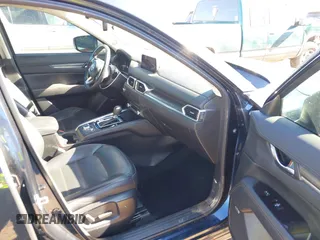 2019 Mazda CX-5 Grand Touring with VIN JM3KFBDM2K1685168, listed as a IAAI auction lot 41323598 with 88,429 mi miles. Bid and sale history available at carsss.com. Image 5.
