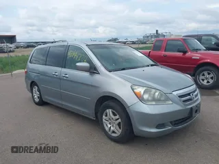 2007 Honda Odyssey EX-L z VIN 5FNRL38717B124209, wystawiony jako IAAI lot #42444334 z przebiegiem 230 123 mil mil oraz . Historia ofert i sprzedaży dostępna na DreamBid. Obrazek 1.