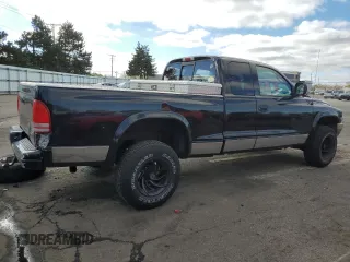 1999 Dodge Dakota SLT with VIN 1B7GG22Y5XS107729, listed as a Copart auction lot 79440034 with 163,718 mi miles and Salvage Title. Bid and sale history available at DreamBid. Image 3.