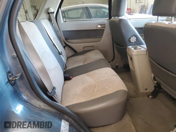 2010 Mercury Mariner Premier z VIN 4M2CN8HG3AKJ29557, wystawiony jako Copart lot #53318115 z przebiegiem 141 895 mil mil oraz Szkoda całkowita • Salvage title. Historia ofert i sprzedaży dostępna na DreamBid. Obrazek 11.