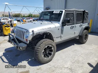 2012 Jeep Wrangler Unlimited Call of Duty MW3 with VIN 1C4BJWFG9CL199551, listed as a Copart auction lot 57097555 with 43,651 mi miles and Salvage title. Bid and sale history available at DreamBid. Image 1.