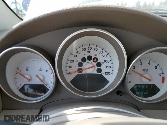 2007 Dodge Caliber SXT with VIN 1B3HB48B27D263783, listed as a Copart auction lot 53116575 with 164,533 mi miles and Salvage Title. Bid and sale history available at DreamBid. Image 9.