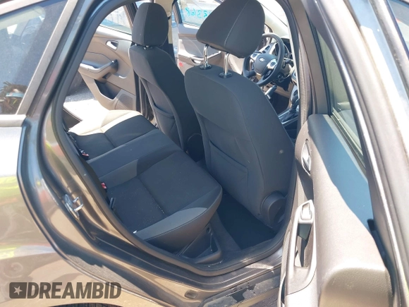2013 Ford Focus SE z VIN 1FADP3F20DL235001, wystawiony jako IAAI lot #42343368 z przebiegiem 202 356 mil mil oraz . Historia ofert i sprzedaży dostępna na DreamBid. Obrazek 8.
