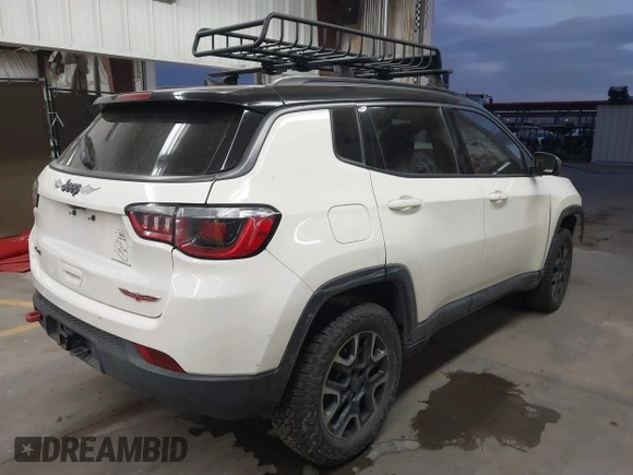 2019 Jeep Compass Trailhawk with VIN 3C4NJDDB8KT668110, listed as a IAAI auction lot 41700848 with 75,855 mi miles and . Bid and sale history available at carsss.com. Image 4.