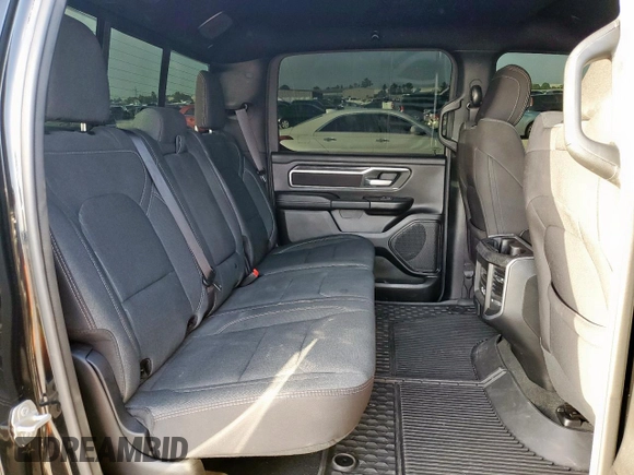 2023 Ram 1500 Big Horn with VIN 1C6SRFFT2PN666039, listed as a Copart auction lot 61458085 with 29,206 mi miles and Salvage title. Bid and sale history available at DreamBid. Image 11.