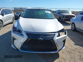 2018 Lexus RX 350 z VIN 2T2ZZMCAXJC106256, wystawiony jako IAAI lot #41658817 z przebiegiem 103 733 mil mil oraz . Historia ofert i sprzedaży dostępna na DreamBid. Obrazek 11.