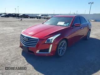 2018 Cadillac CTS Sedan Luxury AWD with VIN 1G6AX5SX0J0141744, listed as a IAAI auction lot 41402270 with 75,620 mi miles. Bid and sale history available at carsss.com. Image 2.