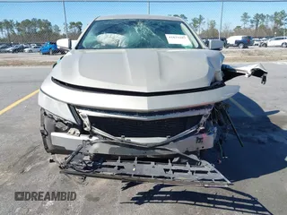 2014 Chevrolet Impala LT with VIN 2G1125S33E9256206, listed as a IAAI auction lot 41829287 with 198,661 mi miles and . Bid and sale history available at DreamBid. Image 18.