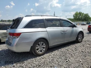 2014 Honda Odyssey EX-L with VIN 5FNRL5H63EB042207, listed as a Copart auction lot 61957605 with 204,563 mi miles and Salvage title. Bid and sale history available at DreamBid. Image 3.