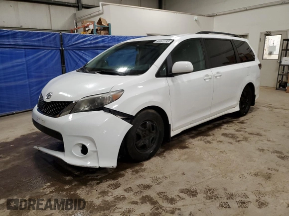 2012 Toyota Sienna SE with VIN 5TDXK3DC1CS206007, listed as a Copart auction lot 58061195 with 166,465 mi miles and Clean title. Bid and sale history available at DreamBid. Image 1.