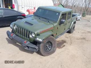 2023 Jeep Gladiator Mojave with VIN 1C6JJTEG6PL564504, listed as a IAAI auction lot 41752685 with 20,430 mi miles and . Bid and sale history available at DreamBid. Image 17.