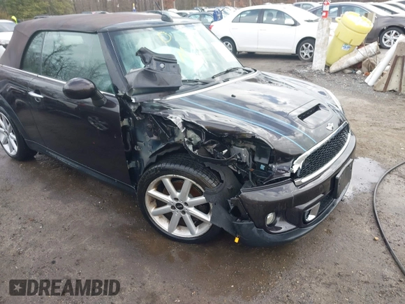 2013 MINI Convertible S with VIN WMWZP3C54DT297304, listed as a IAAI auction lot 41377572 with 101,991 mi miles and . Bid and sale history available at DreamBid. Image 6.