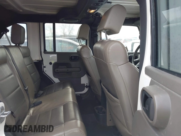 2010 Jeep Wrangler Unlimited Sahara with VIN 1J4HA5H19AL177179, listed as a IAAI auction lot 41565342 with 181,392 mi miles. Bid and sale history available at carsss.com. Image 8.