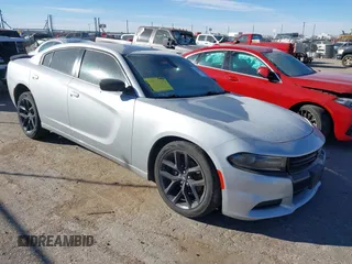 2021 Dodge Charger SXT with VIN 2C3CDXBG4MH540364, listed as a IAAI auction lot 41233208 with 47,776 mi miles. Bid and sale history available at carsss.com. Image 1.