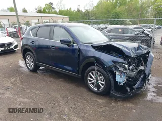 2023 Mazda CX-5 S Select with VIN JM3KFBBM5P0254047, listed as a IAAI auction lot 42069916 with 29,600 mi miles and . Bid and sale history available at carsss.com. Image 1.