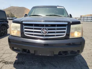 2002 Cadillac Escalade z VIN 1GYEC63T42R189976, wystawiony jako Copart lot #57852565 z przebiegiem 243 089 mil mil oraz Szkody całkowita. Historia ofert i sprzedaży dostępna na DreamBid. Obrazek 5.