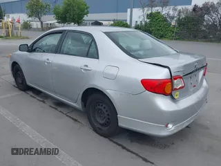 2011 Toyota Corolla L with VIN 2T1BU4EE9BC588160, listed as a IAAI auction lot 42072554 with 137,454 mi miles. Bid and sale history available at carsss.com. Image 3.