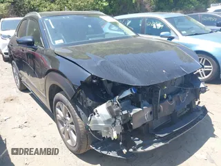 2022 Mazda CX-30 S Carbon Edition with VIN 3MVDMBCL3NM440188, listed as a IAAI auction lot 42259723 with 48,555 mi miles and . Bid and sale history available at DreamBid. Image 1.