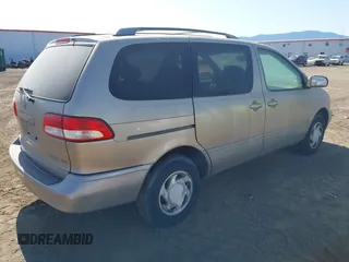 2002 Toyota Sienna LE with VIN 4T3ZF13C72U419558, listed as a IAAI auction lot 42531912 with 246,872 mi miles and . Bid and sale history available at DreamBid. Image 4.
