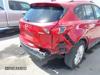 2015 Mazda CX-5 Grand Touring with VIN JM3KE2DY7F0537017, listed as a IAAI auction lot 41953011 with 78,098 mi miles. Bid and sale history available at carsss.com. Image 6.