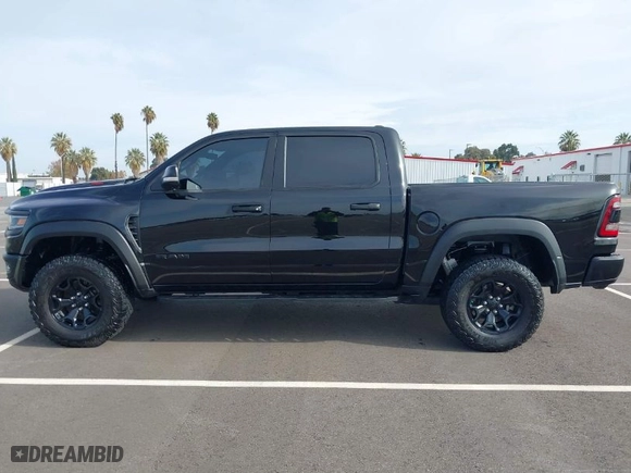 2021 Ram 1500 TRX with VIN 1C6SRFU98MN703355, listed as a IAAI auction lot 40913103 with 27,200 mi miles. Bid and sale history available at carsss.com. Image 14.