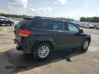 2014 Dodge Journey SXT with VIN 3C4PDCBG5ET126590, listed as a Copart auction lot 54770335 with 126,950 mi miles and Salvage Title. Bid and sale history available at DreamBid. Image 3.