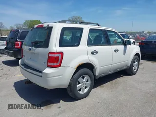 2009 Ford Escape XLS with VIN 1FMCU02759KD02022, listed as a IAAI auction lot 42228347 with 258,533 mi miles and . Bid and sale history available at DreamBid. Image 4.