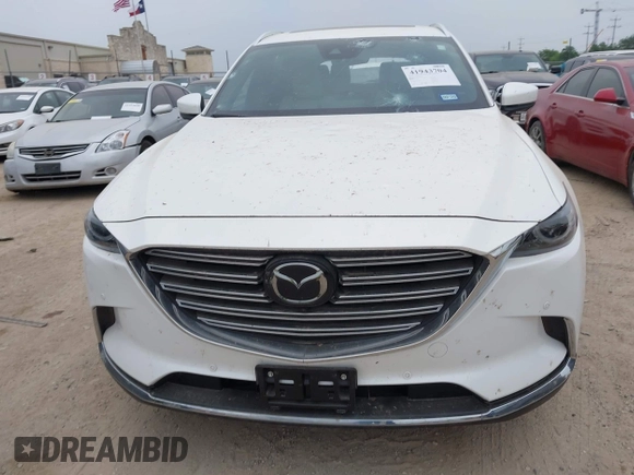 2023 Mazda CX-9 Grand Touring с VIN JM3TCBDY0P0634099, выставлен на аукционе IAAI как лот 41943704 с пробегом 5 615 миль миль и . История ставок и продаж доступна на DreamBid. Изображение 12.