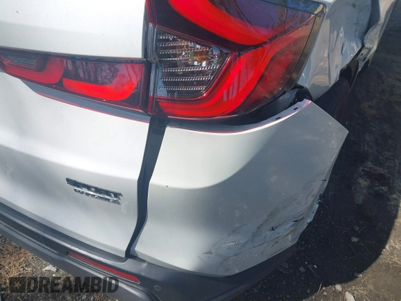 2023 Honda CR-V Sport Touring with VIN 5J6RS6H90PL003877, listed as a IAAI auction lot 41938027 with 38,500 mi miles and . Bid and sale history available at DreamBid. Image 6.
