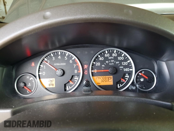 2007 Nissan Frontier Nismo with VIN 1N6AD06W57C439818, listed as a Copart auction lot 61210285 with 174,708 mi miles and Salvage title. Bid and sale history available at DreamBid. Image 9.