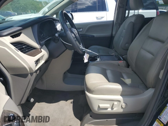 2015 Toyota Sienna XLE with VIN 5TDYK3DC4FS643797, listed as a Copart auction lot 55975385 with 61,882 mi miles and Salvage Title. Bid and sale history available at DreamBid. Image 7.