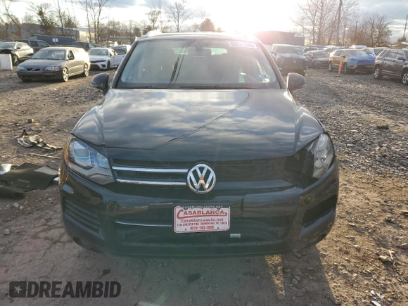 2012 Volkswagen Touareg Sport z VIN WVGEF9BP7CD006020, wystawiony jako Copart lot #88211145 z przebiegiem 180 729 mil mil oraz Szkoda całkowita • Salvage title. Historia ofert i sprzedaży dostępna na DreamBid. Obrazek 5.