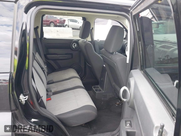 2007 Dodge Nitro SXT with VIN 1D8GT28K27W502900, listed as a IAAI auction lot 42077428 with 166,114 mi miles. Bid and sale history available at carsss.com. Image 8.