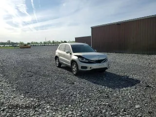 2013 Volkswagen Tiguan S with VIN WVGAV3AX9DW626065, listed as a Copart auction lot 58014145 with 128,858 mi miles and Salvage title. Bid and sale history available at DreamBid. Image 14.