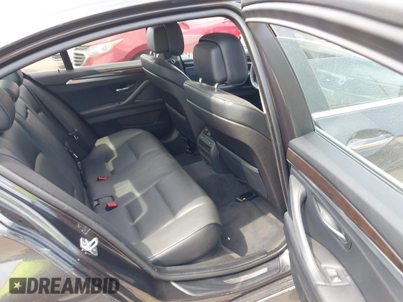 2013 BMW 5 Series 528i xDrive z VIN WBAXH5C55DD109674, wystawiony jako IAAI lot #41944084 z przebiegiem 132 074 mil mil oraz . Historia ofert i sprzedaży dostępna na DreamBid. Obrazek 8.