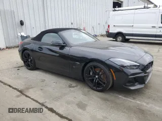 2024 BMW Z4 sDrive30i with VIN WBAHF3C09RWY35844, listed as a Copart auction lot 61809905 with Not provided miles and Salvage title. Bid and sale history available at DreamBid. Image 4.