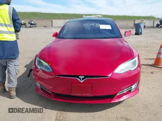 2018 Tesla Model S 75D with VIN 5YJSA1E26JF259651, listed as a IAAI auction lot 41690804 with Not Provided miles and . Bid and sale history available at DreamBid. Image 12.
